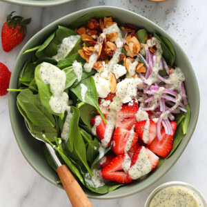 A bowl of strawberry spinach salad