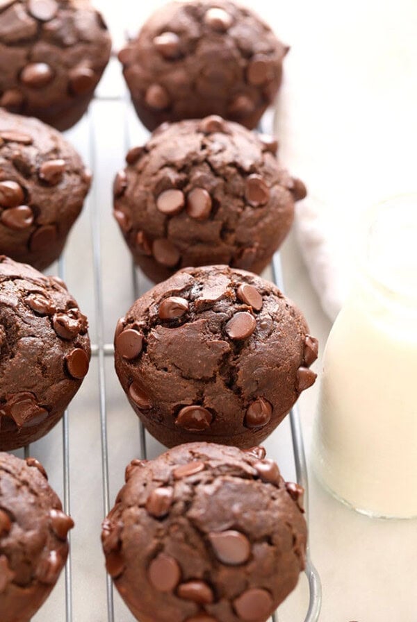 Healthy chocolate chip muffins on a cooling rack.