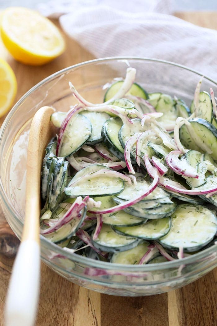 Creamy cucumber salad in a bowl