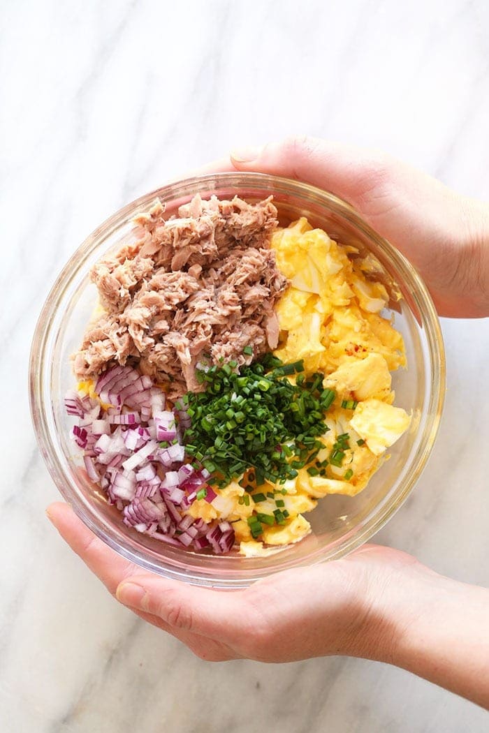 tuna egg salad ingredients in a bowl