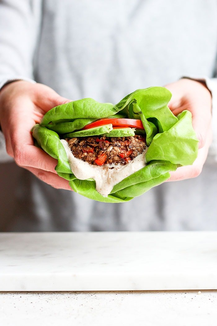 A black bean burger in butter lettuce