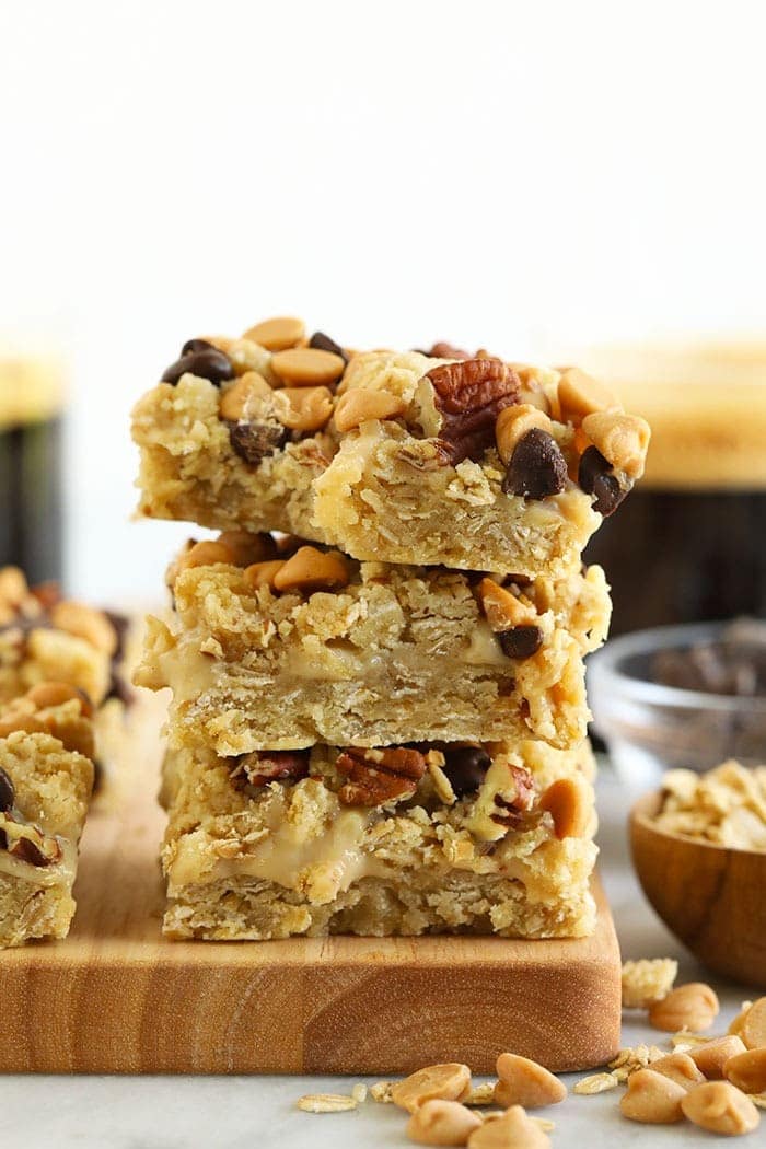 three carmelitas stacked on a cutting board