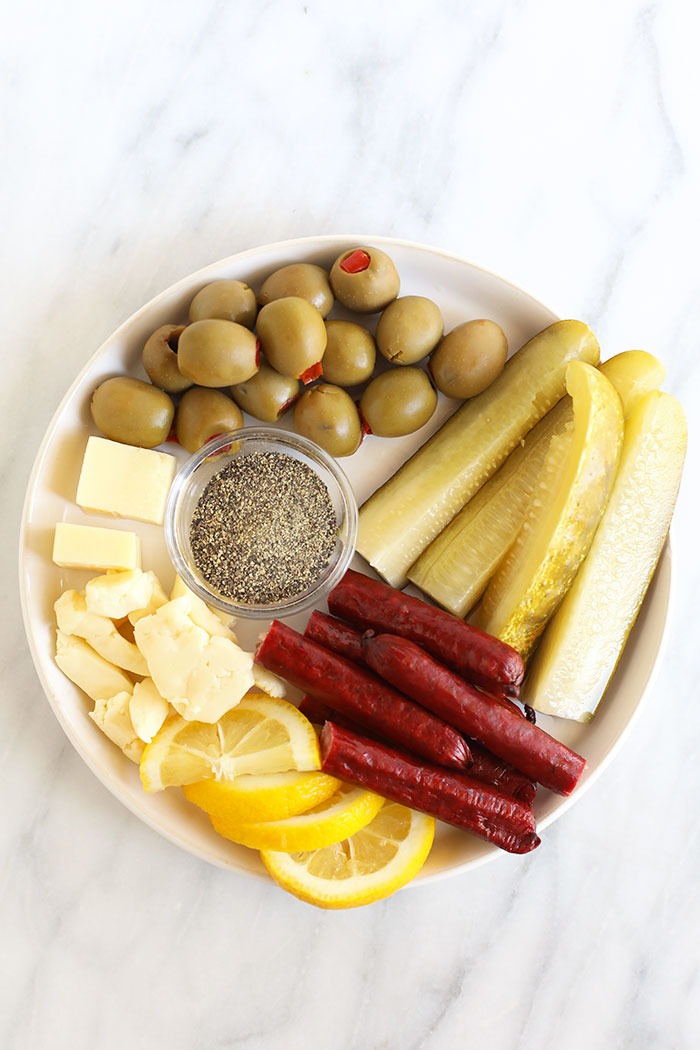 A plate of ingredients for a bloody mary recipe