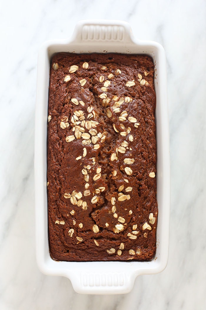 Cinnamon apple bread loaf in a loaf pan.