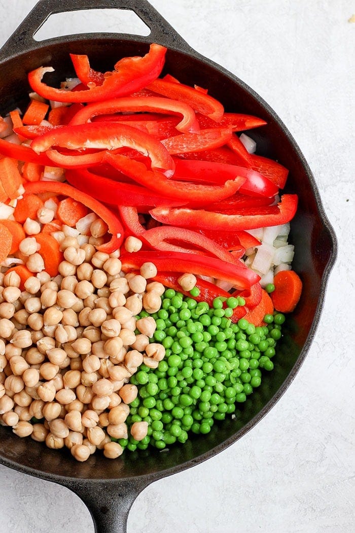 creamy cashew curry vegetables in a cast iron skillet