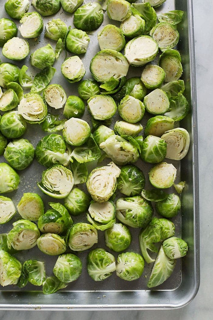 sliced brussels sprouts on sheet pan