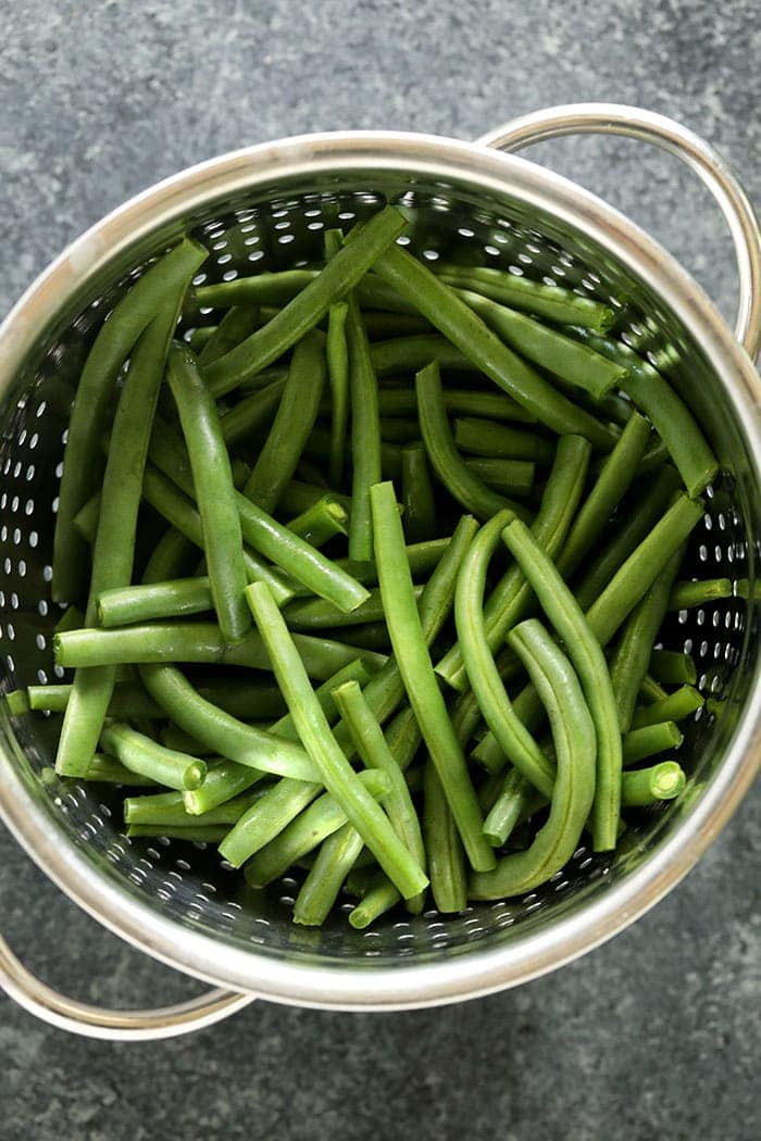 green beans in strainer