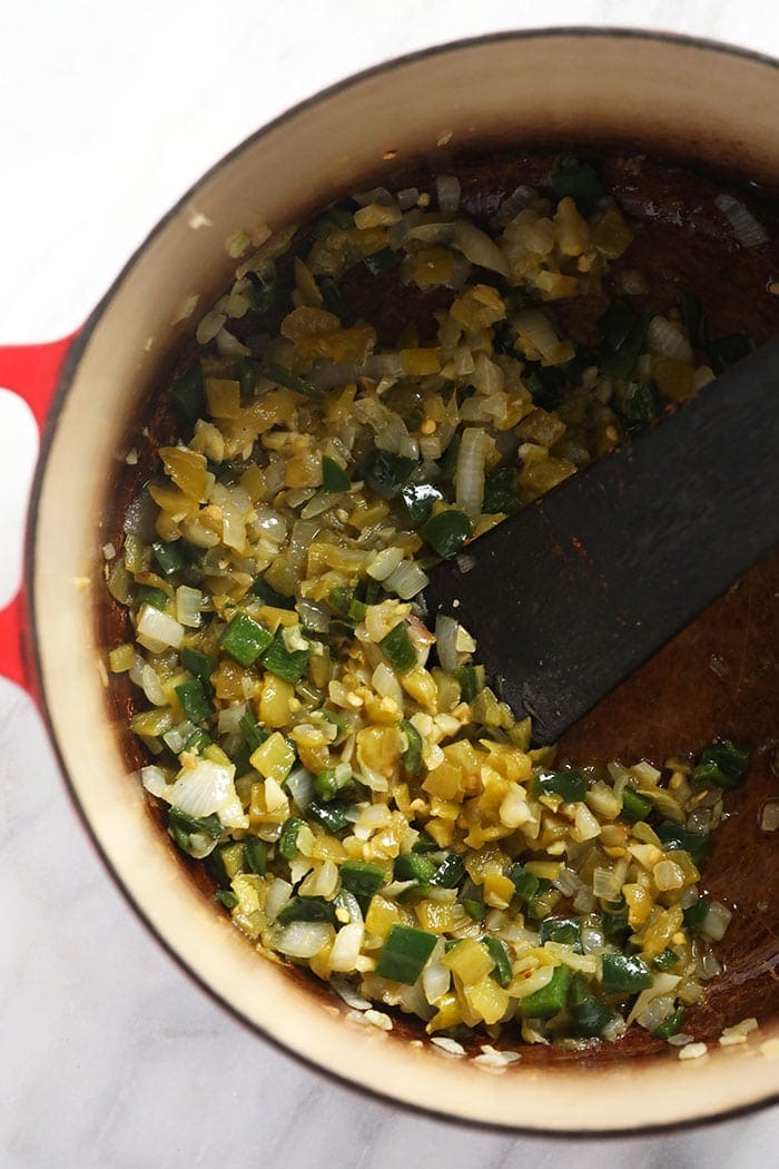 diced veggies in a dutch oven for white bean chicken chili.