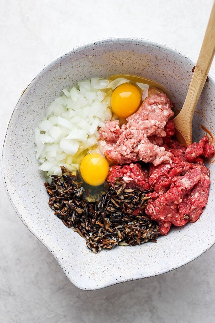 wild rice meatloaf ingredients in a bowl ready to be mixed