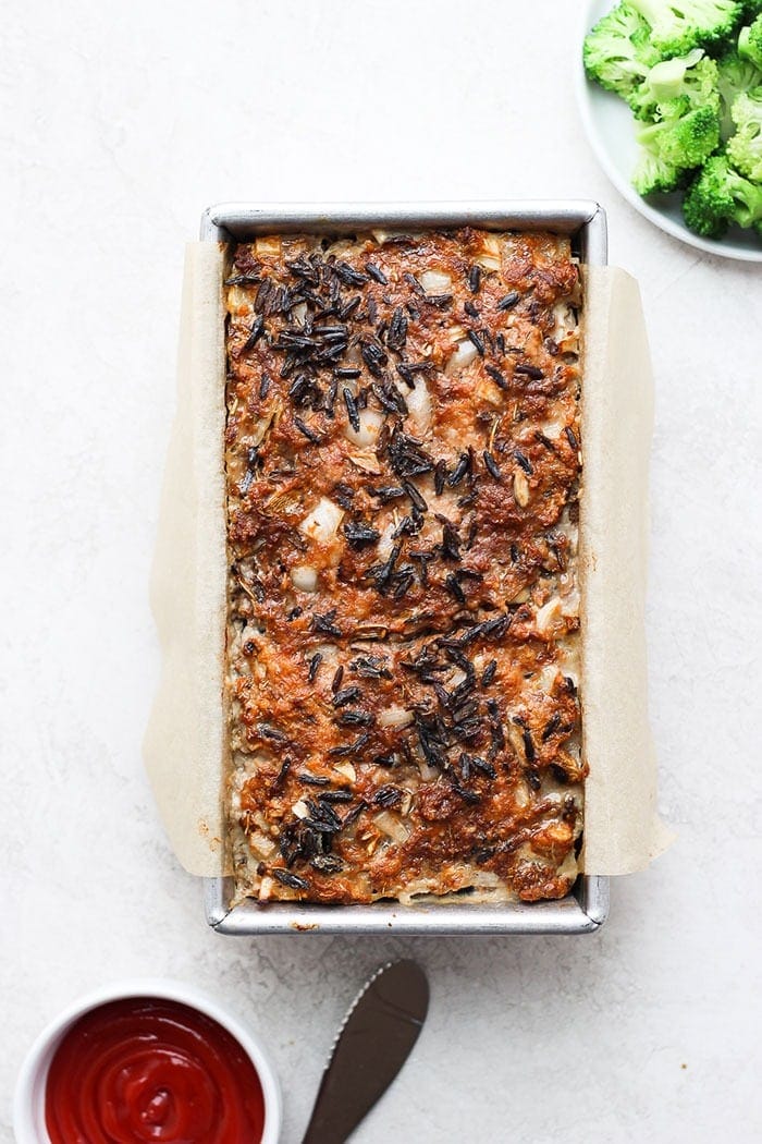 wild rice meatloaf just out of the oven ready to be topped with ketchup