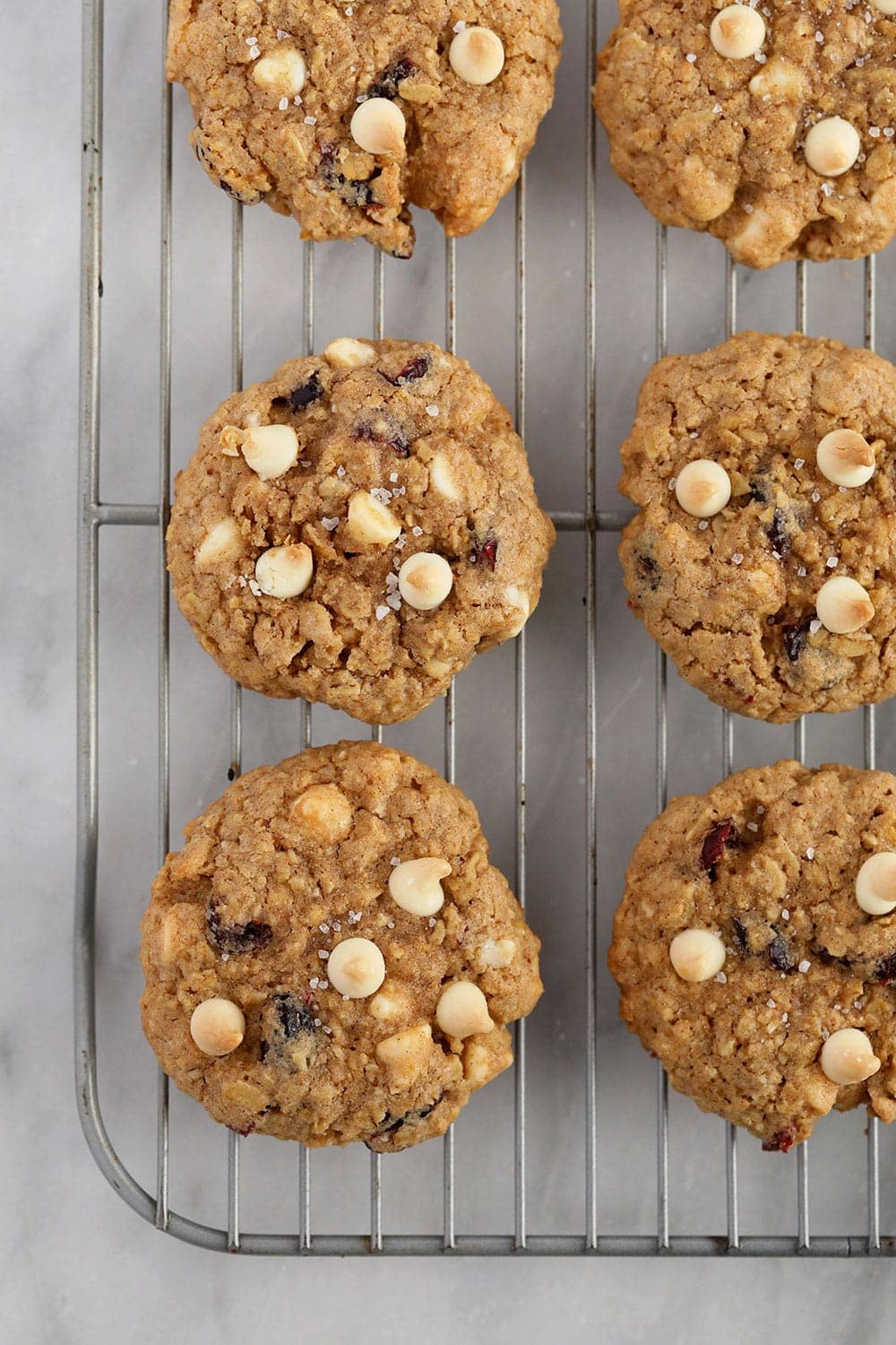 white chocolate cranberry oatmeal cookies on a cooling rack