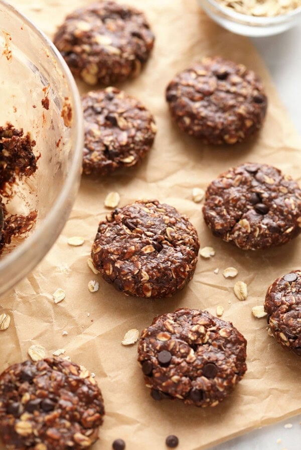 No-bake chocolate oat cookies arranged on a baking sheet.