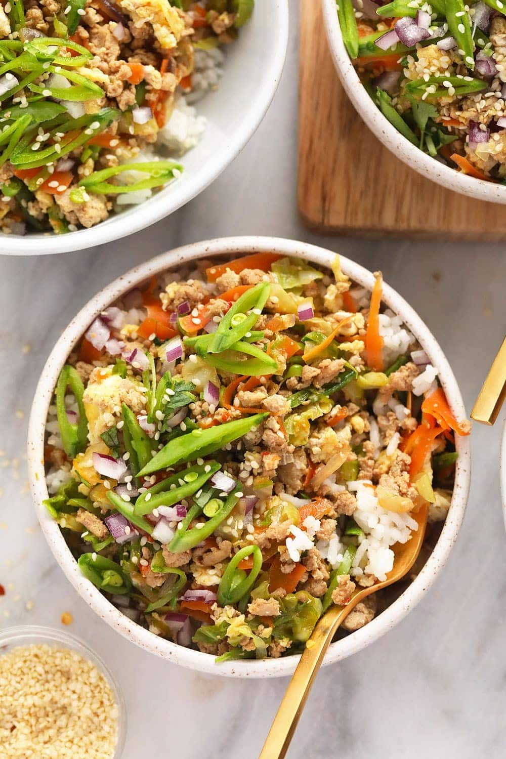 egg roll in a bowl served with rice