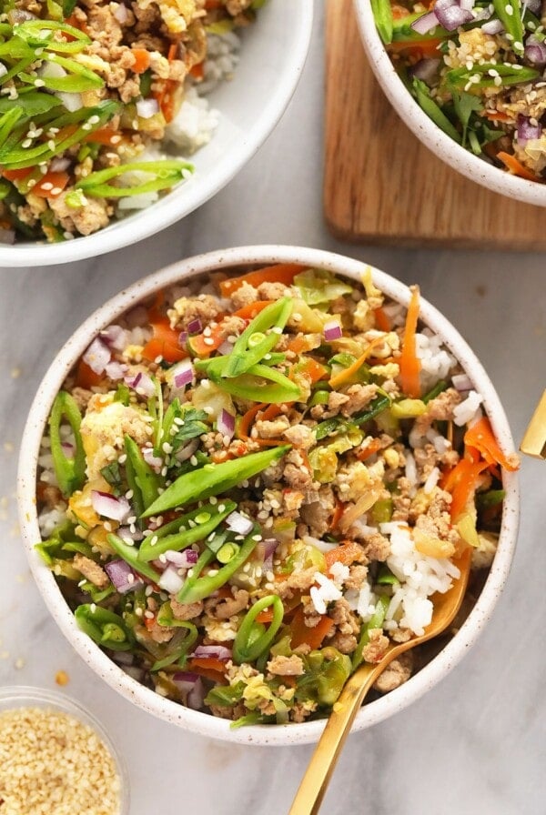 egg roll in a bowl served with rice