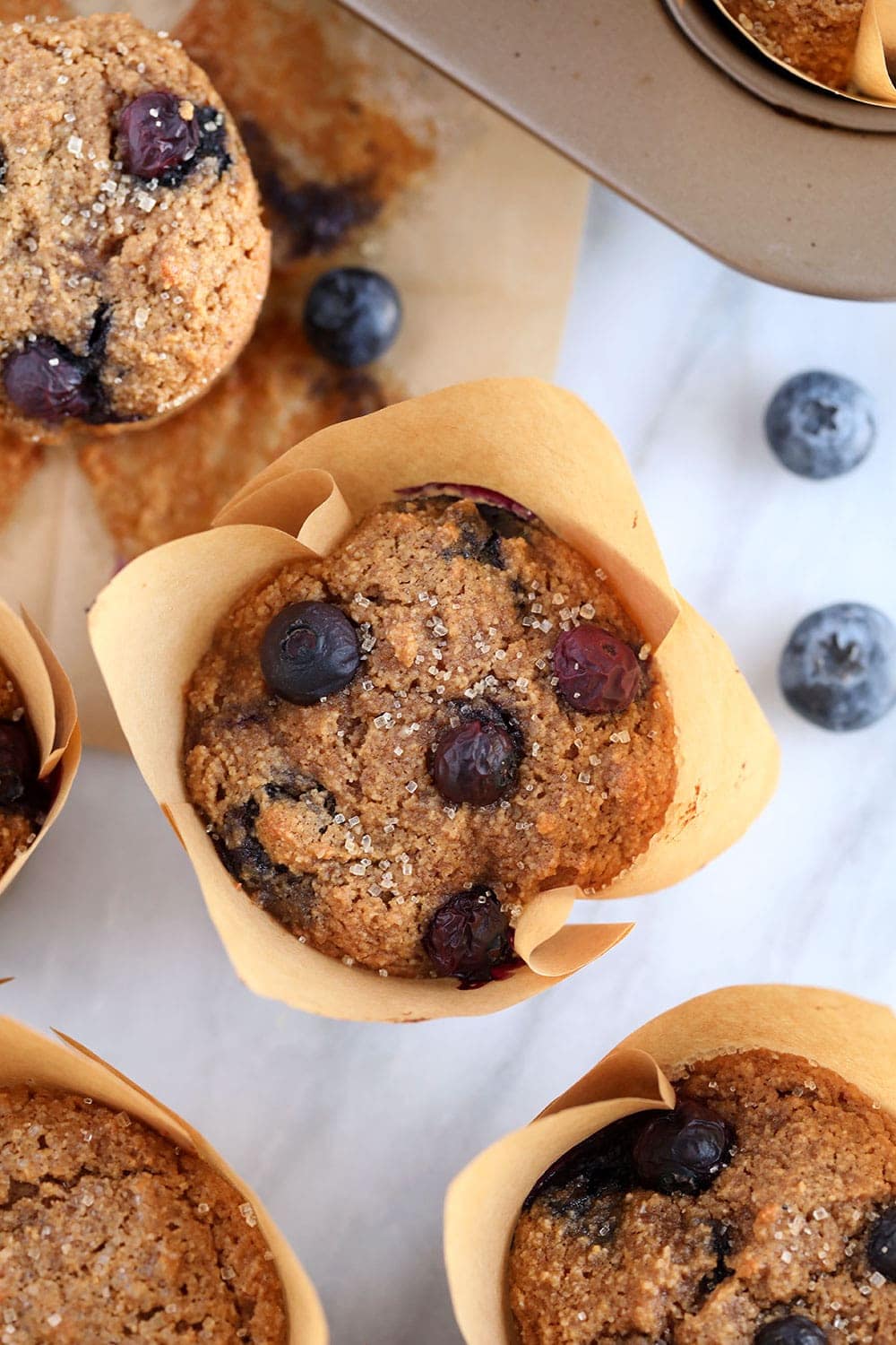 almond flour blueberry muffins in a muffin liner