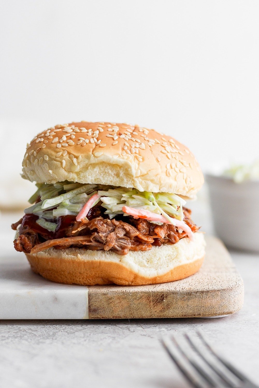 pulled born on bun with slaw.