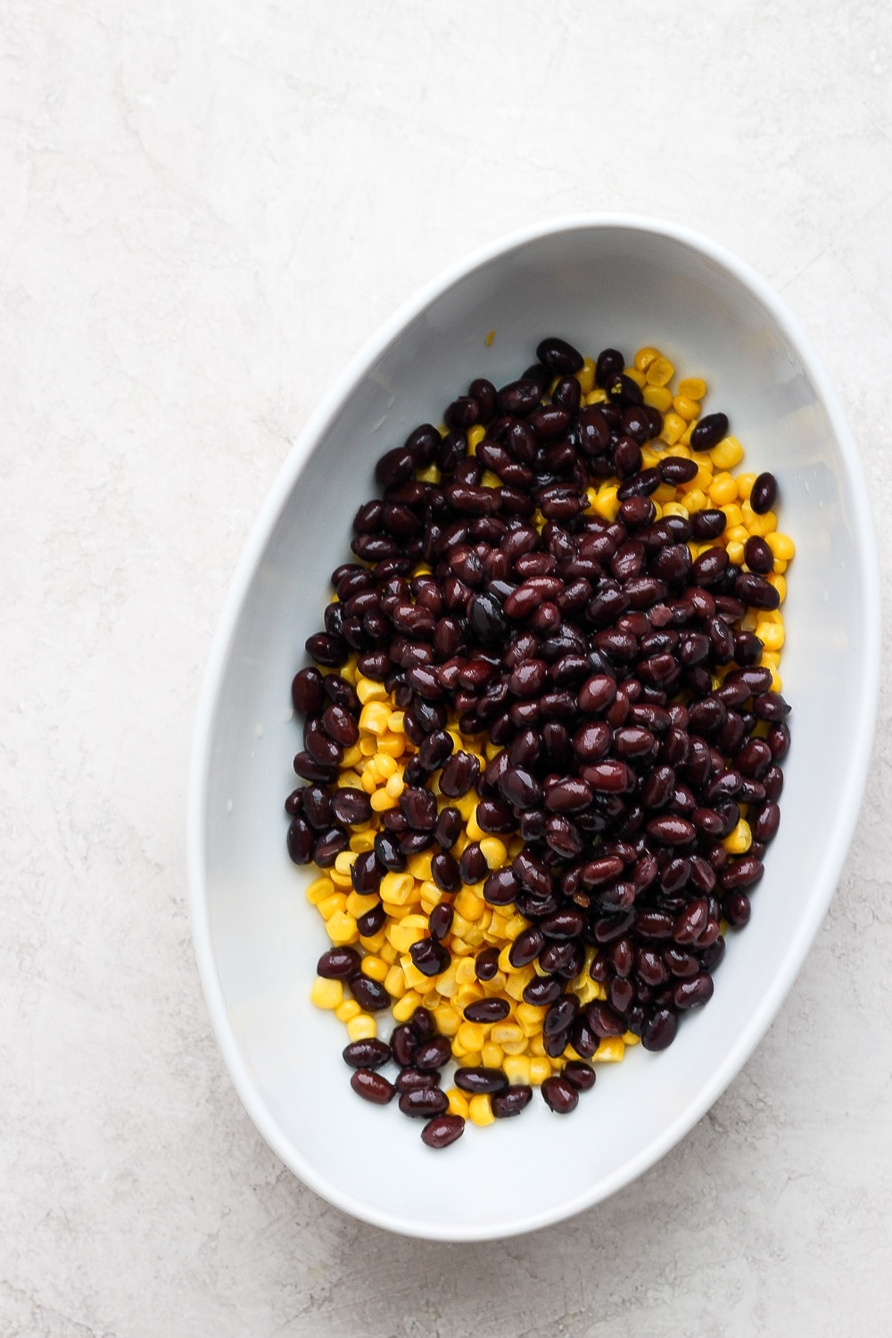 black beans and sweet corn ready to be mixed into vegan queso