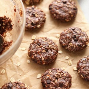 No bake chocolate oatmeal cookies arranged on a baking sheet.