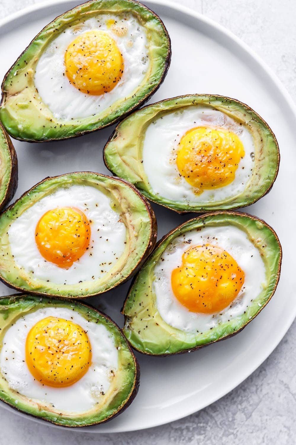 Avocado baked eggs on a plate