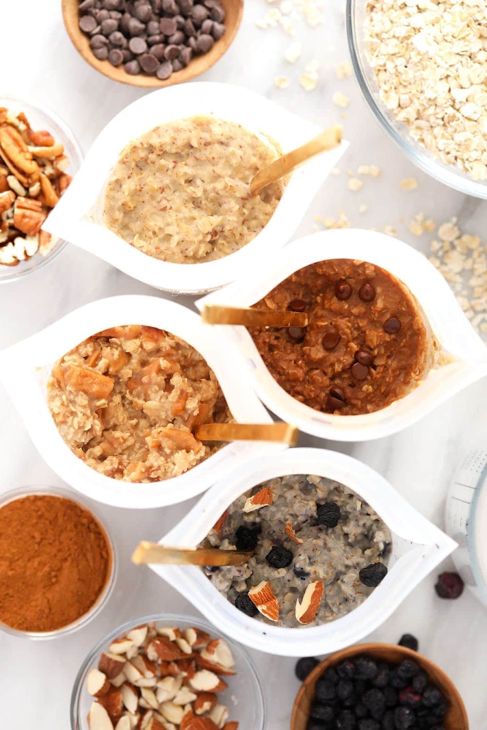 instant oatmeal 4 ways mixed in bowls and ready to be eaten