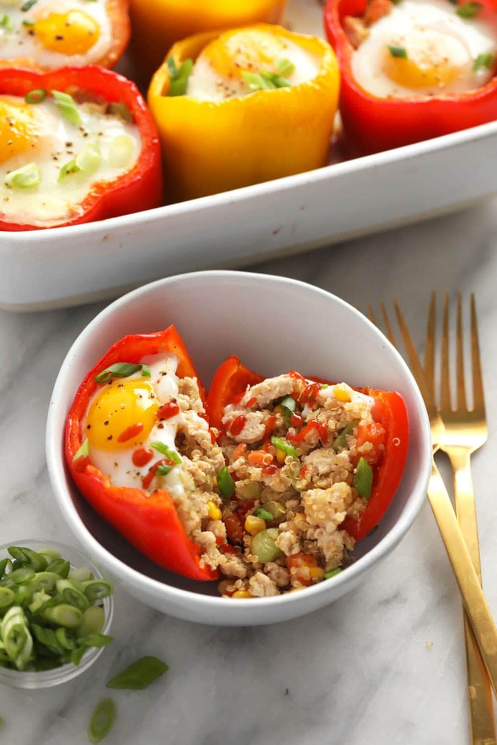 chicken fried quinoa stuffed pepper cut in half