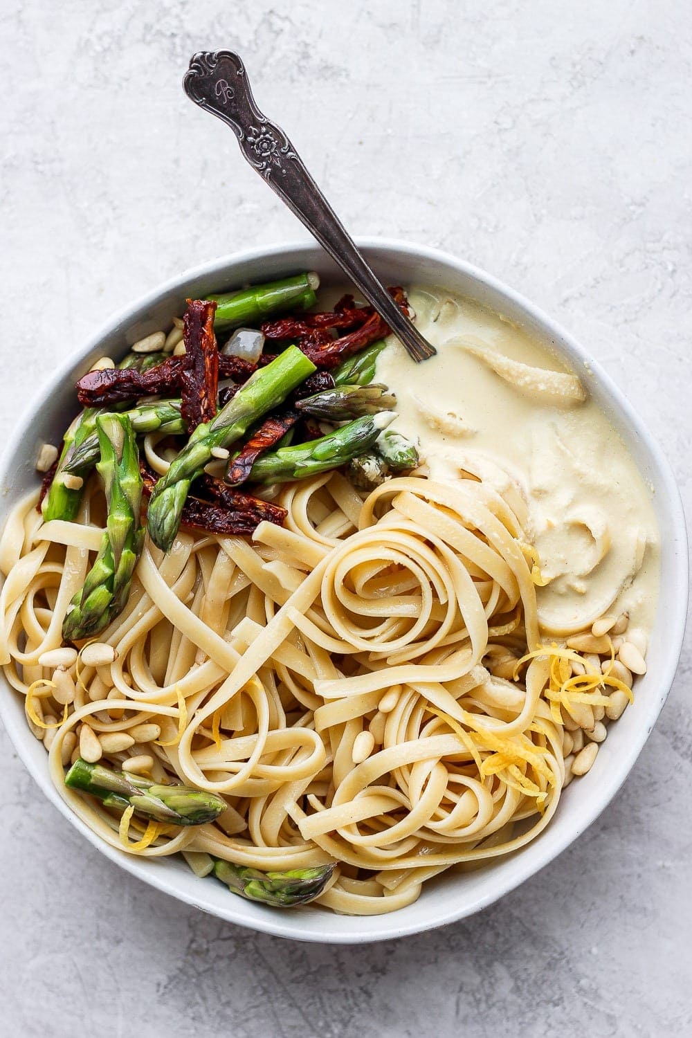 creamy vegan asparagus pasta in a bowl