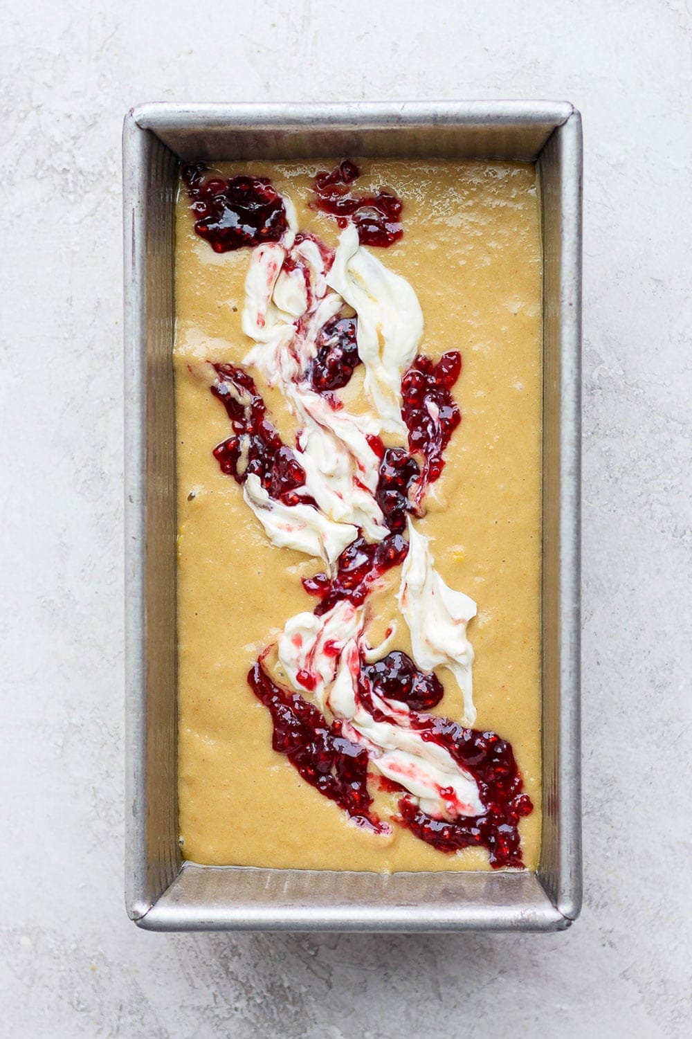 lemon bread batter in loaf pan