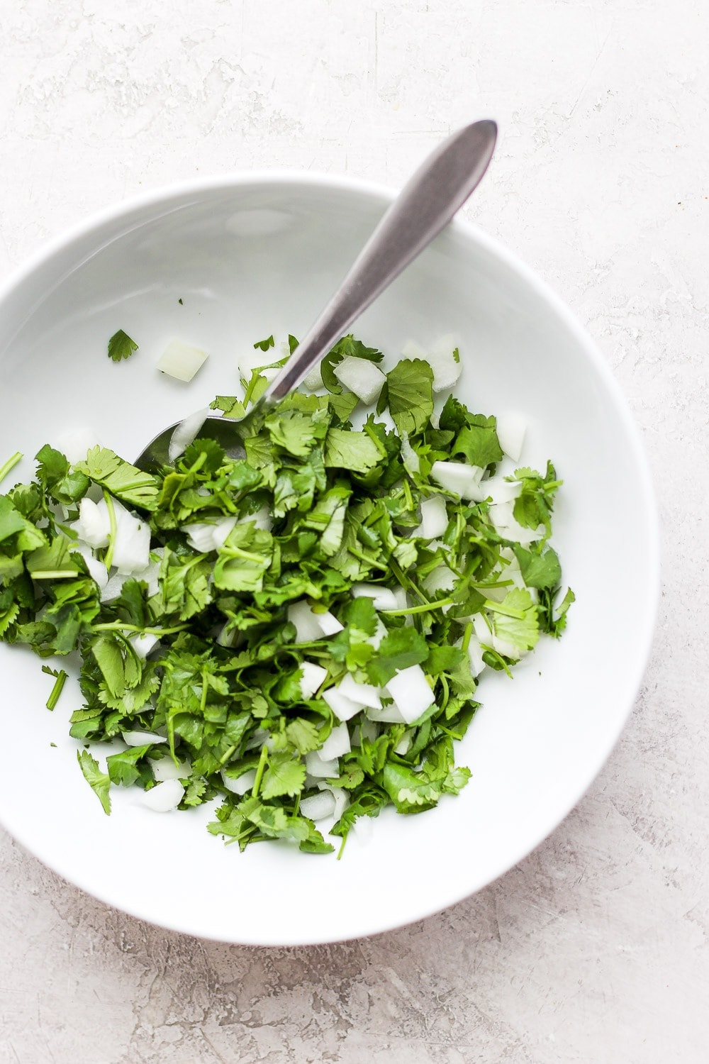 cilantro and onion for shredded chicken tacos