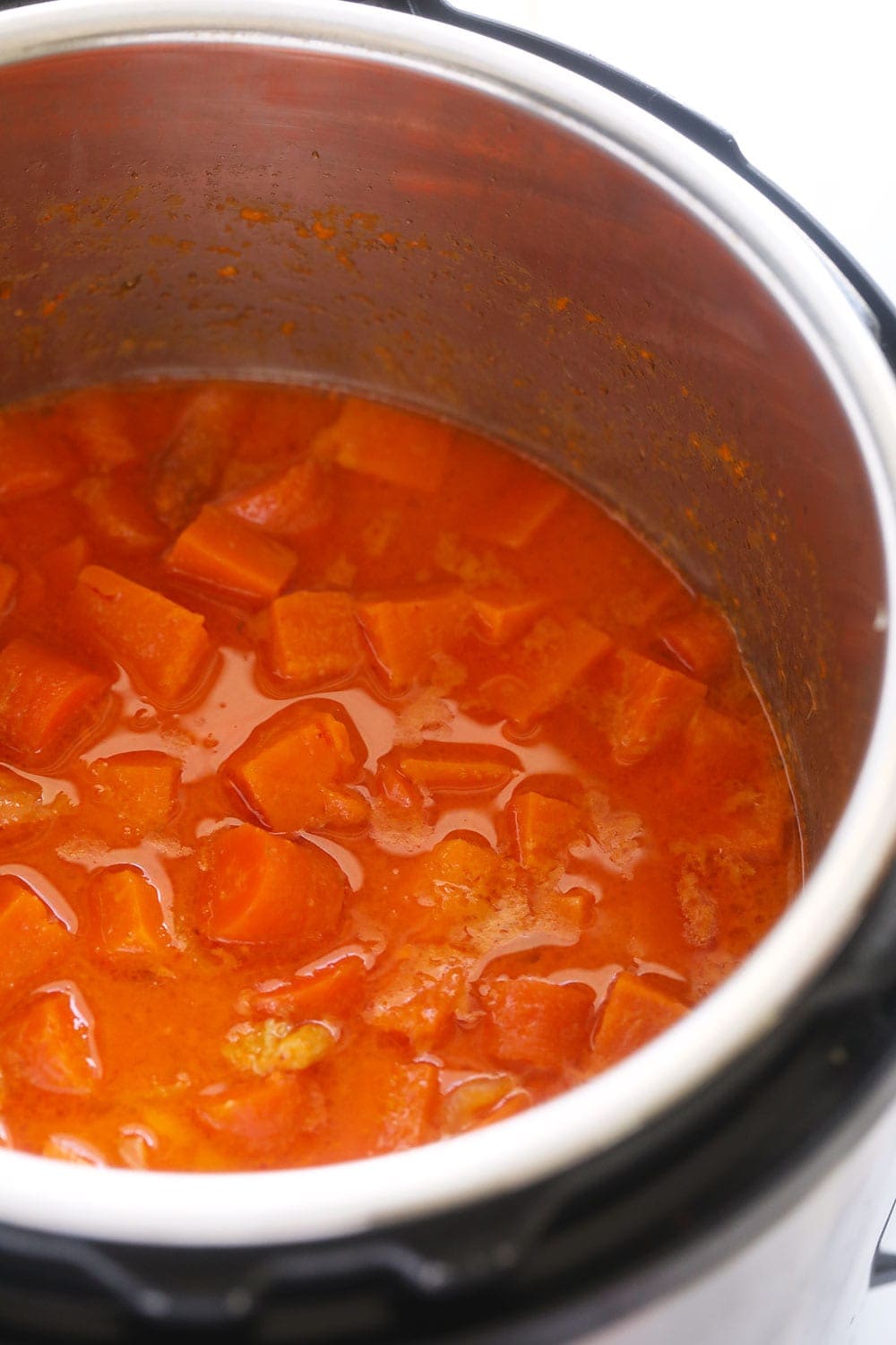 instant pot sweet potato carrot ginger soup ingredients ready to be blended