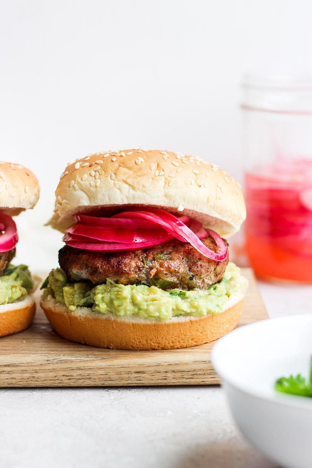 turkey burgers on a bun, ready to be served.