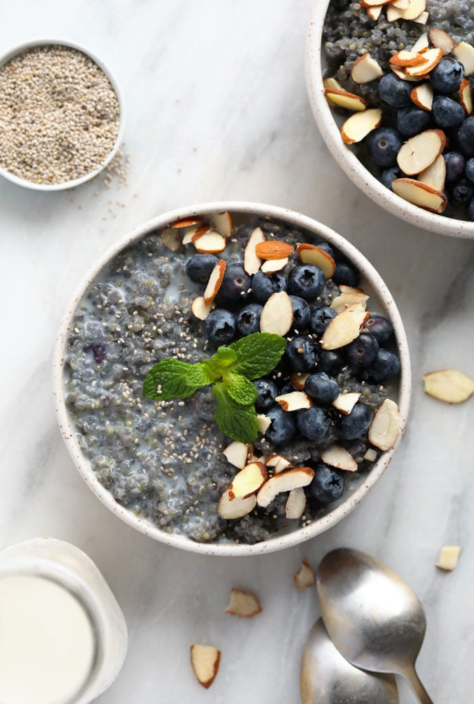 Blueberry quinoa breakfast bowl in a bowl and ready to eat. 