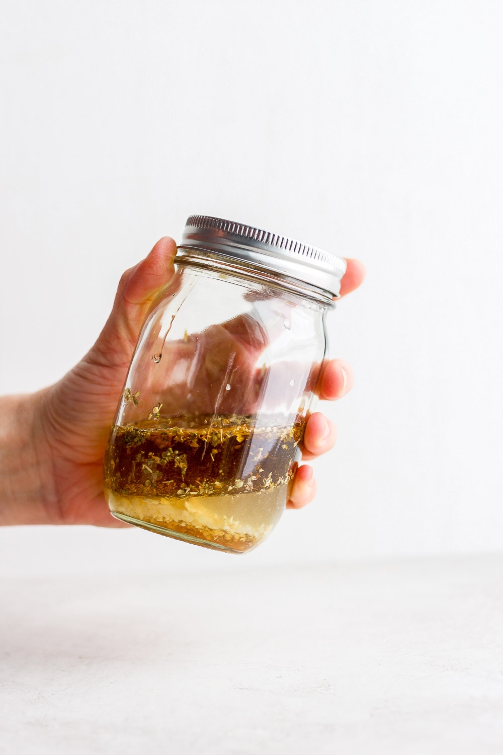 Greek chicken marinade in Mason jar