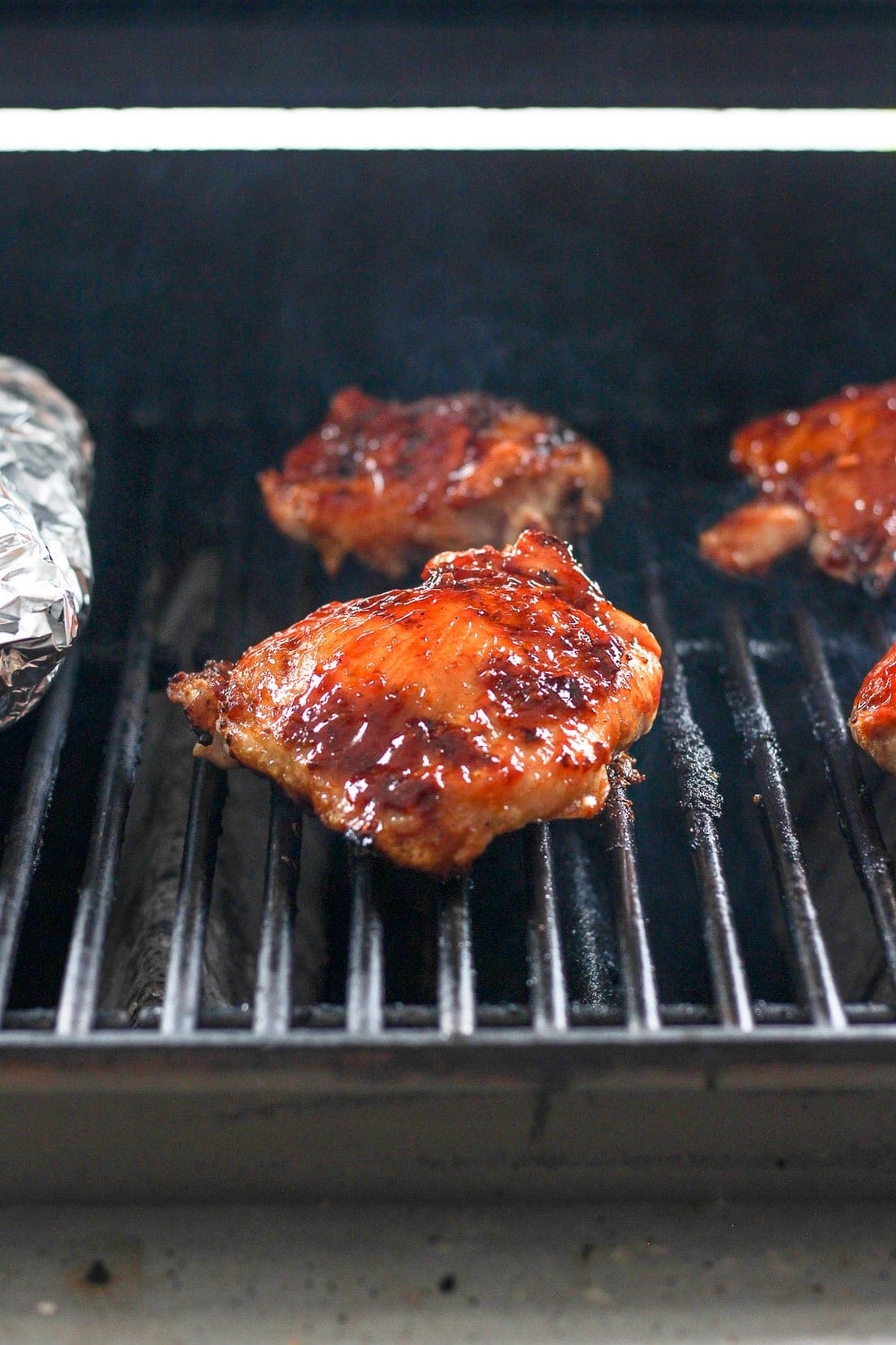 chicken thighs on grill.