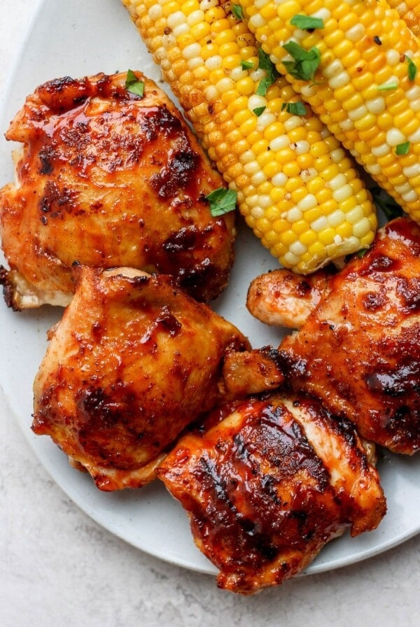 grilled chicken thighs on plate