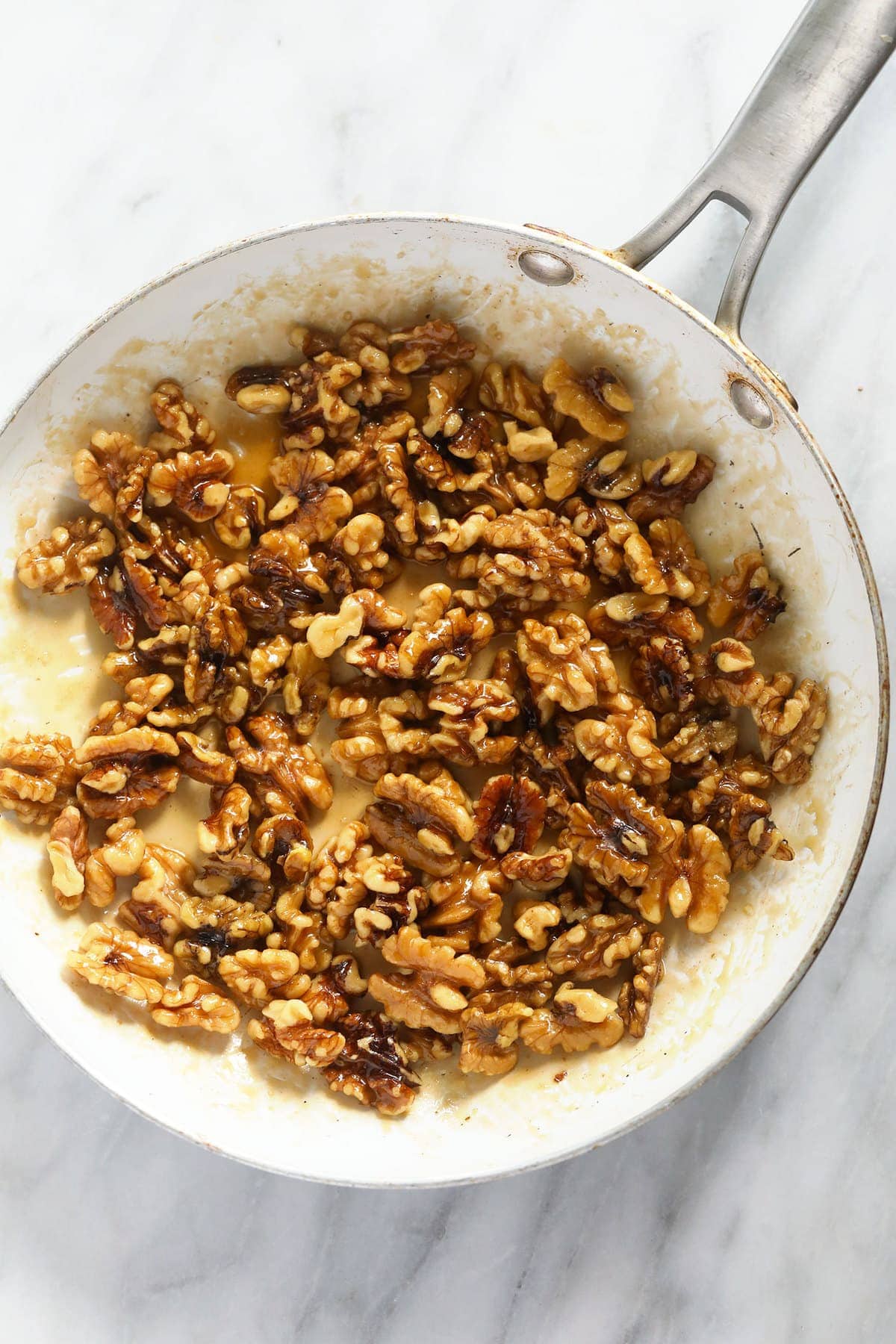 Candied walnuts in a pan