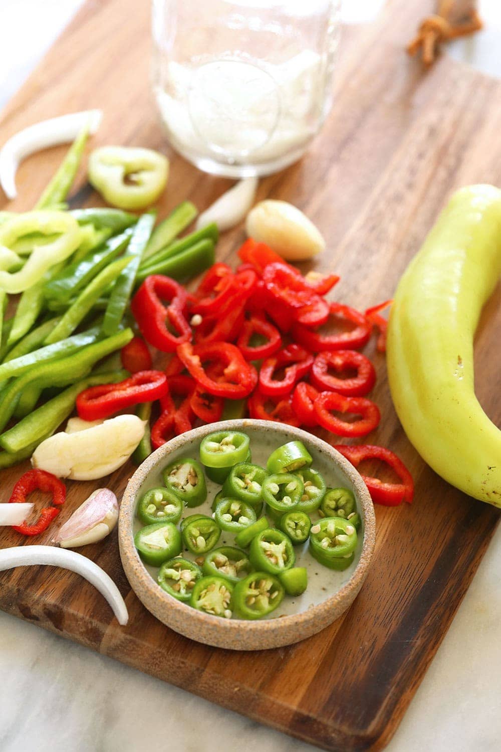 sliced peppers ready to be pickled