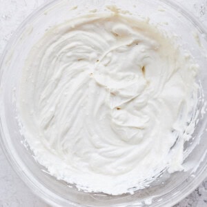 Cream cheese frosting in a bowl.