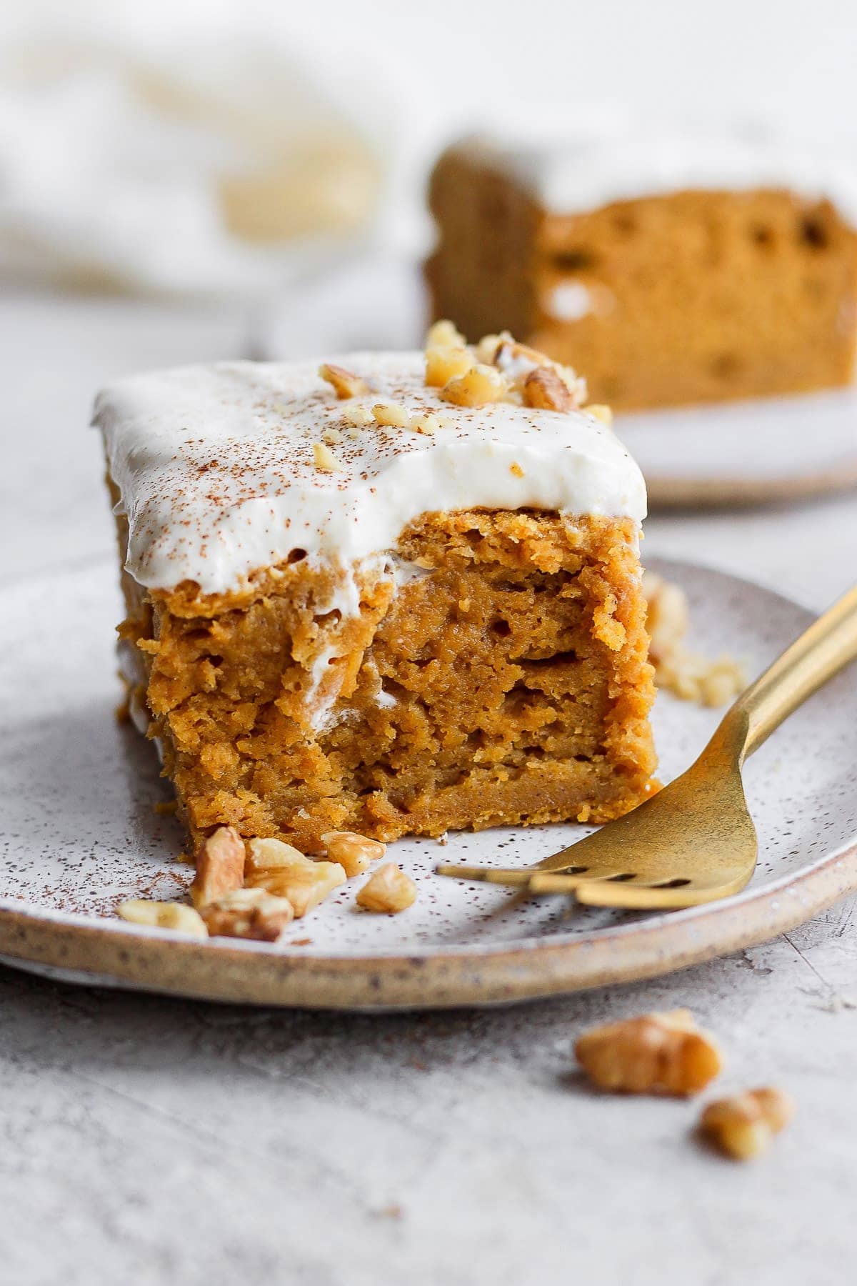 slice of pumpkin sheet cake on a plate