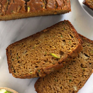 Zucchini bread slices on a plate.