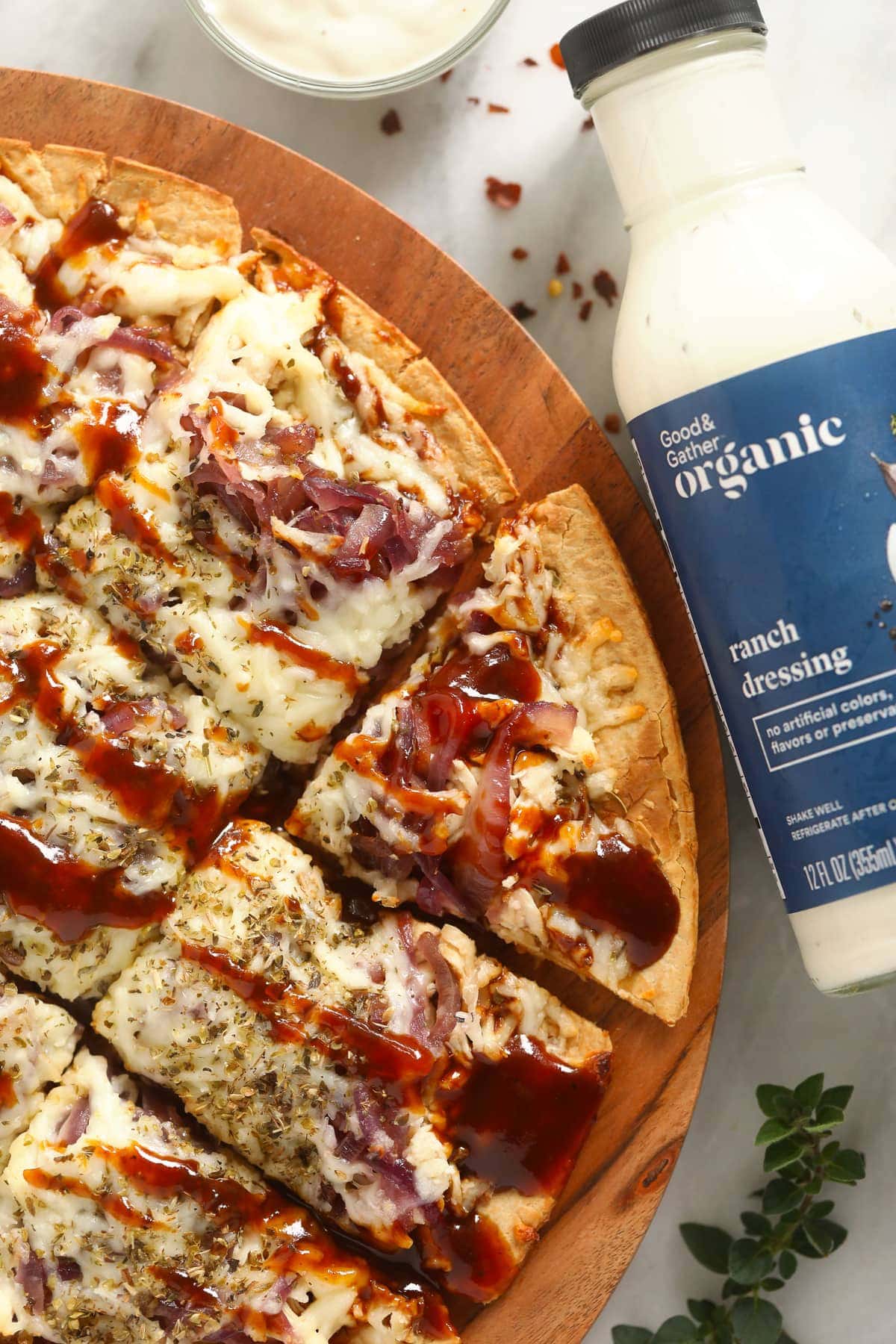 bbq chicken pizza on cutting board