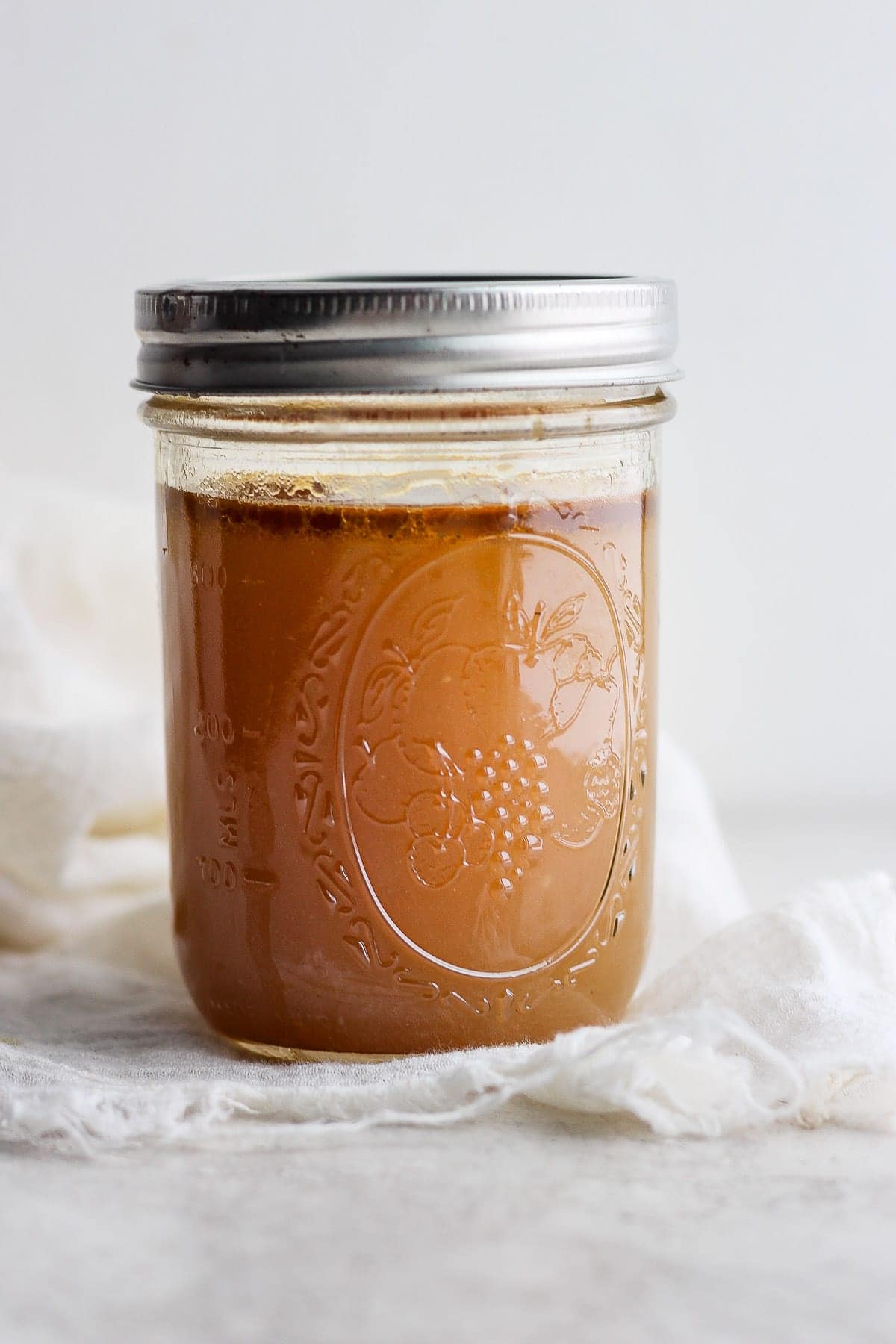 Chicken broth in a mason jar. 