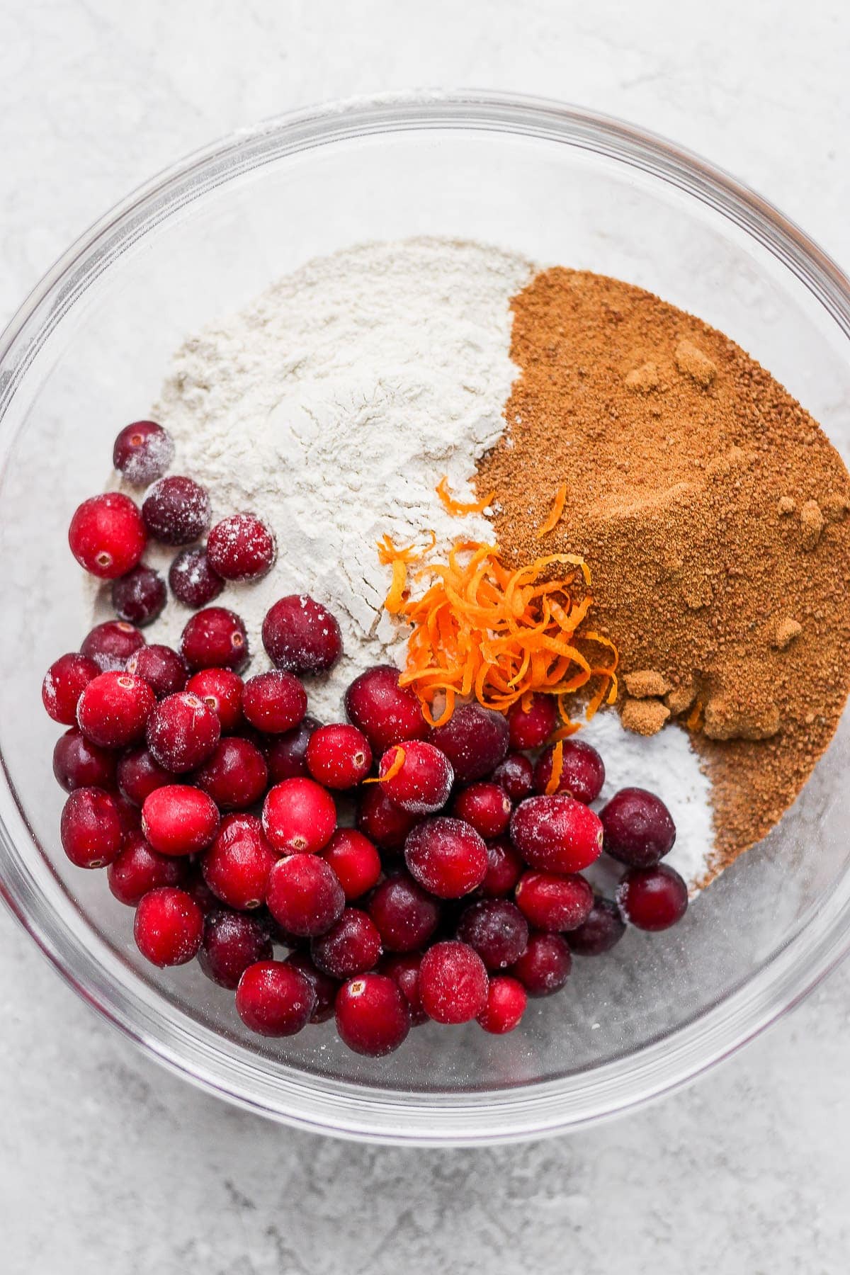 dry ingredients for cranberry orange bread in a bowl