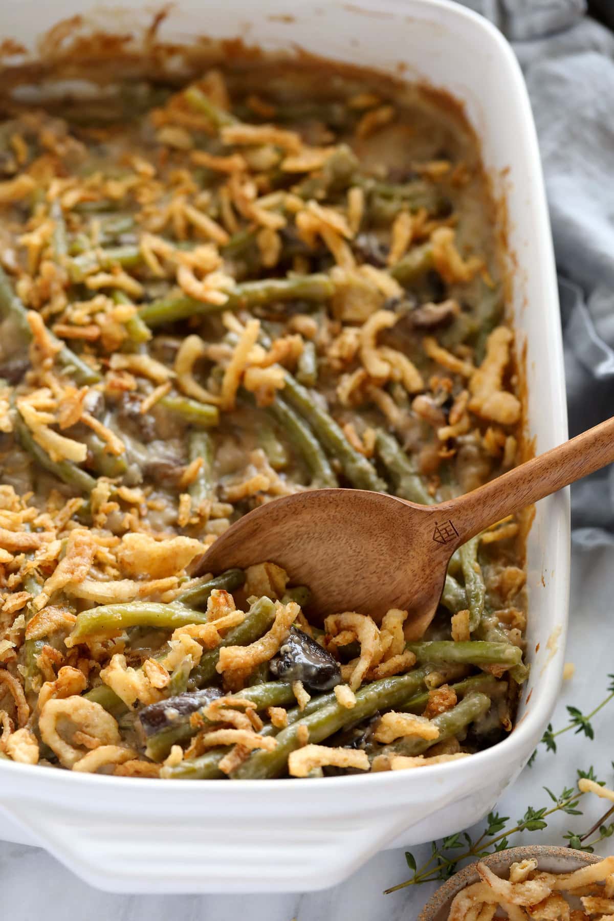 casserole with onions and a spoon