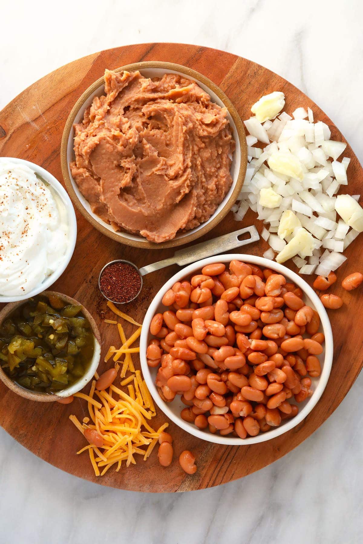 bean dip ingredients ready to be mixed together