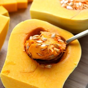 Cleaning out butternut squash.