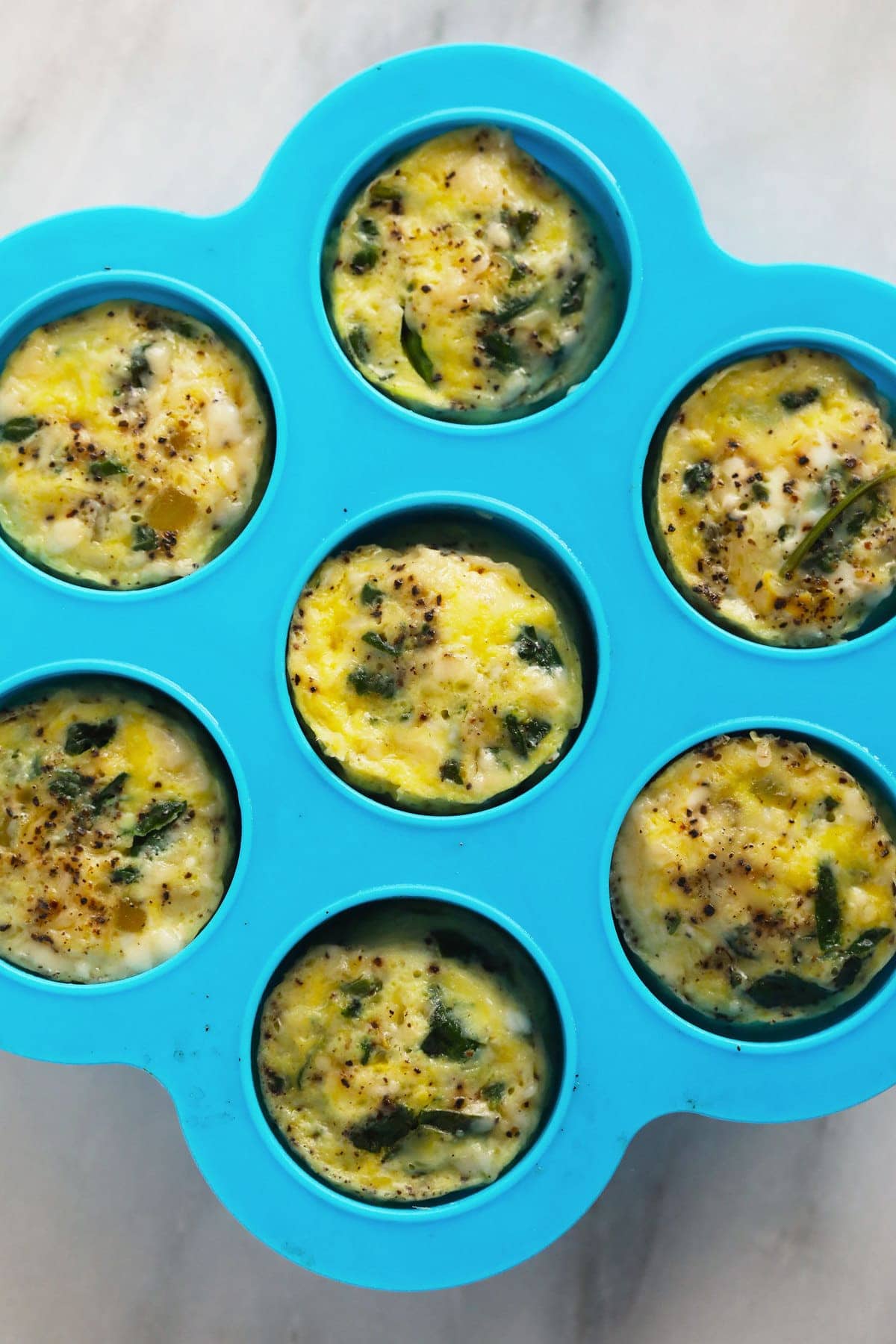 Cooked Instant Pot egg bites in a silicone mold. 