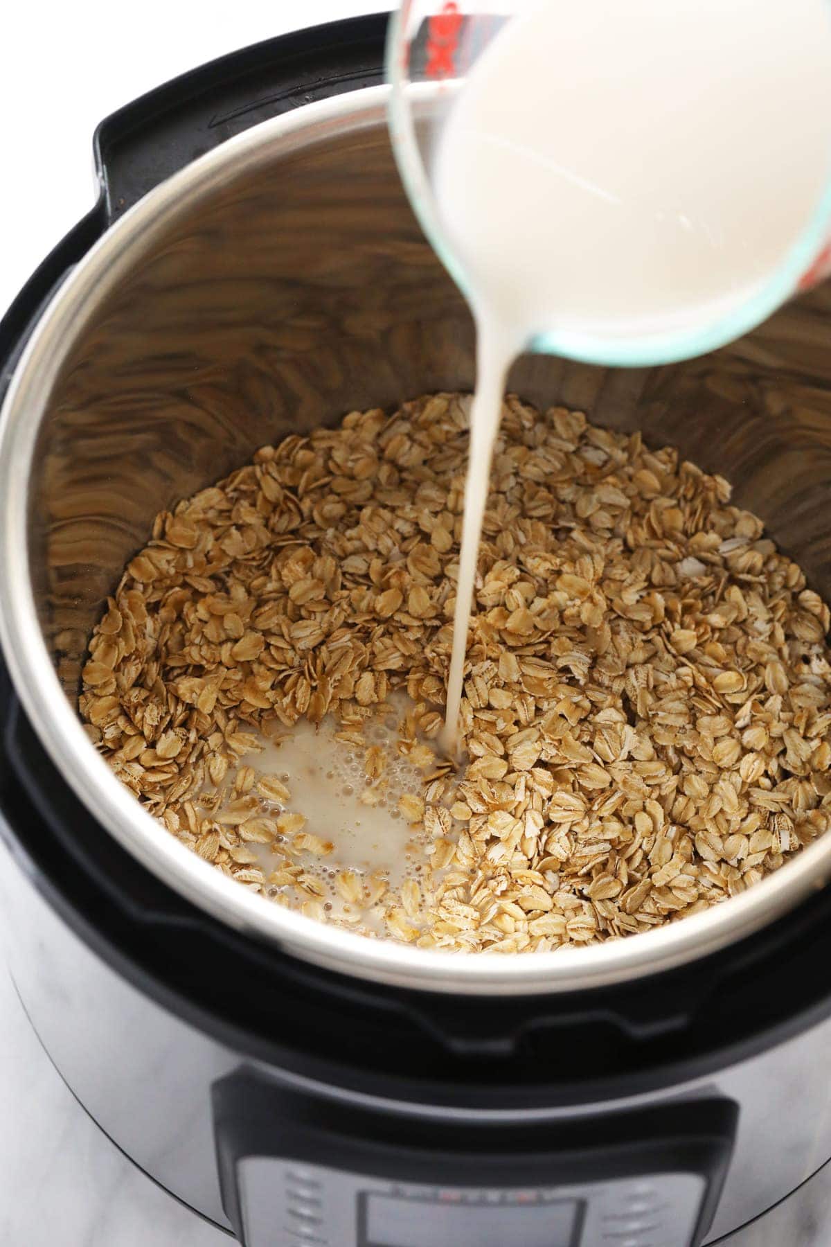 pouring milk into Instant Pot