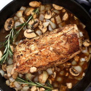 pork tenderloin and gravy in skillet.