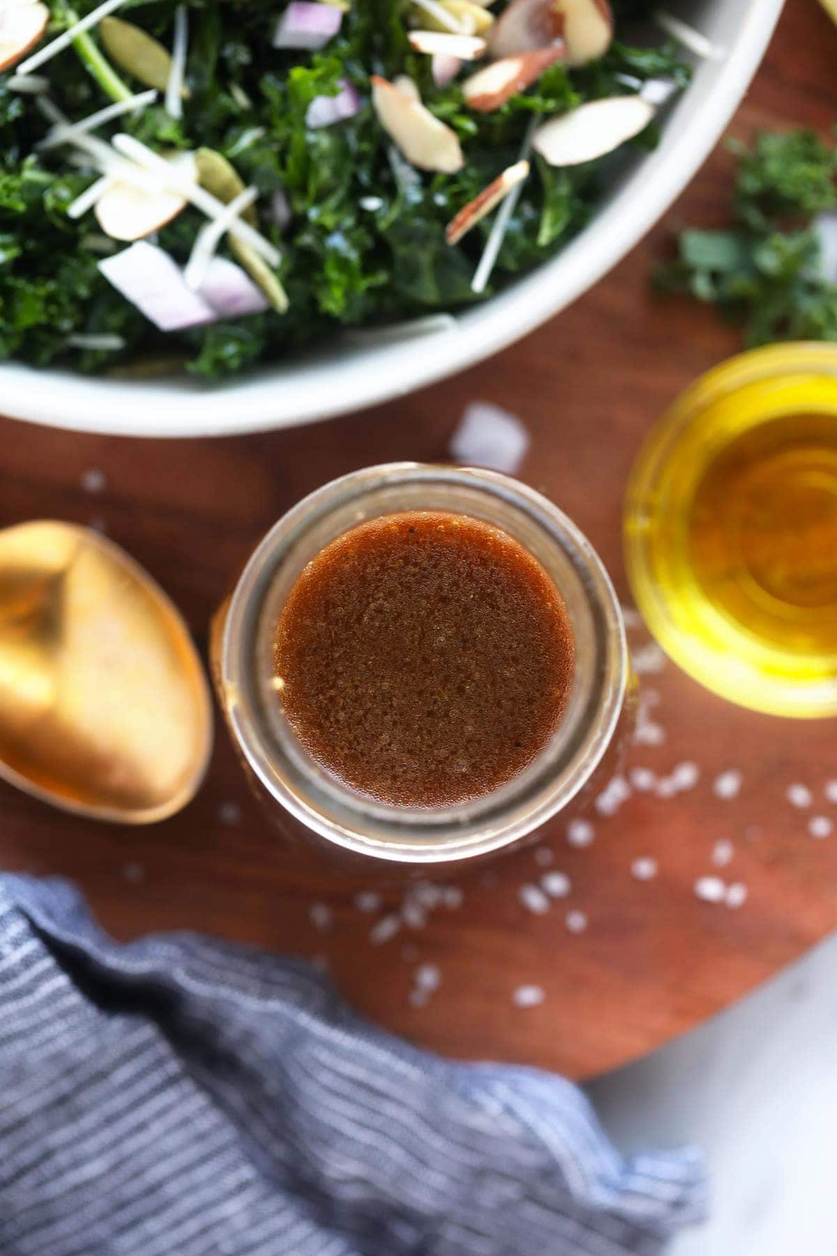 balsamic vinaigrette next to spoon