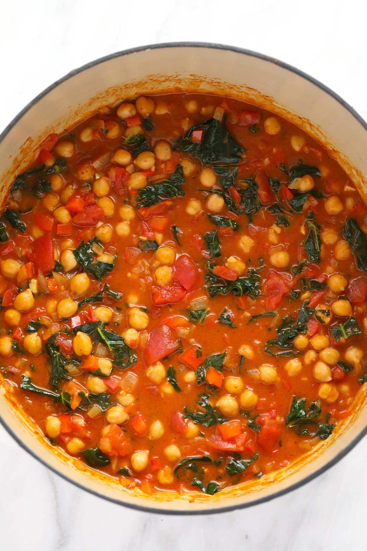 chickpea curry in a dutch oven, ready to be served